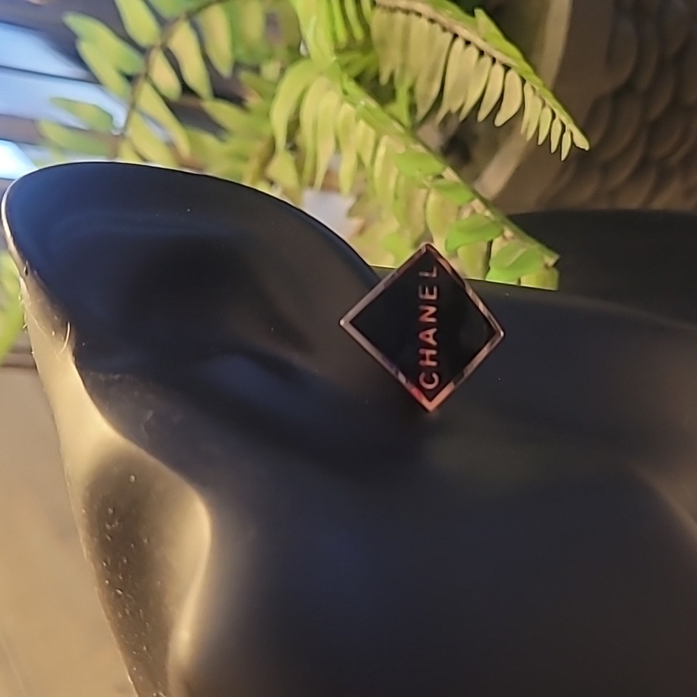 CC fashion earrings on Abstract diamond Shape.